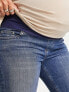 Фото #5 товара ASOS DESIGN Maternity ultimate skinny jeans in authentic mid blue with under the bump waistband