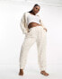 ASOS DESIGN Curve lounge co-ord animal borg jogger in cream