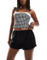 Фото #1 товара ASOS DESIGN poplin frill hem shorts in black