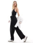 & Other Stories relaxed leg stretch jumpsuit with camisole straps and tie waist in black Черный, L - EU 44 - фото #3