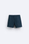 Check-texture weave swimming trunks