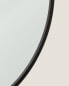 Фото #8 товара Зеркало интерьерное ZARAHOME с круглой формой и черной металлической рамой.