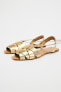 LEATHER CAGE SANDALS