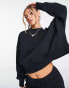 Фото #1 товара Nike mini swoosh extra oversized crop sweatshirt in black and sail