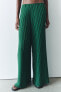 PLEATED TROUSERS