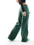 Nike Streetwear oversized fleece wide leg jogger in dark green