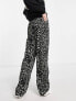 Фото #2 товара Pieces Tall exclusive flared trousers in black floral
