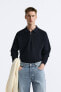Knit quarter-zip polo shirt
