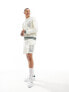 Фото #4 товара ASOS DESIGN co-ord oversized sweatshirt in off white towelling with collegiate embroidery