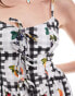 Фото #2 товара ASOS DESIGN tie front cami tea dress in black gingham fruit print