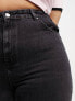 ONLY Curve high waisted jeans with frayed hem in black