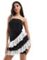 In The Style exclusive bandeau dress with contrast asymmetric polka dot trim in black