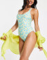 Фото #1 товара Urban Threads cross back swimsuit in light blue and yellow ditsy floral print