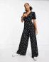 ASOS DESIGN – Jumpsuit aus Krepp mit Sternenmuster, V-Ausschnitt und Puffärmeln