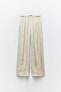 Creased-effect palazzo trousers