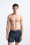 Sun print swimming trunks