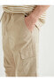 Фото #5 товара Брюки Koton с поясом на завязках и карманами на молнии Paraşüt Pantolon с деталями