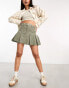 Фото #1 товара ASOS DESIGN cord pleated mini skirt in khaki