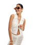 ASOS DESIGN knitted split front waistcoat co-ord in stitch detail in white