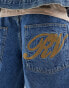 Reclaimed Vintage unisex western longer length denim jorts with embroidery in blue wash