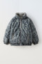 Reversible printed puffer jacket