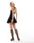 Фото #1 товара Motel open back mini kilt dress in black