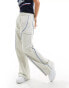 Nike woven trousers in light ivory