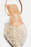 High-heel slingback shoes with faux pearls