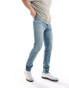 Фото #2 товара ASOS DESIGN skinny jeans in a tinted vintage mid wash