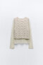 Knit sweater with contrast vest