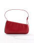 ASOS DESIGN asymmetric buckle shoulder bag in red