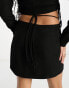 Annorlunda wrap around mini skirt co-ord in black