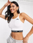 The North Face strap back tank top with logo hem in white Exclusive at ASOS