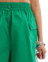 adidas Originals three stripe cargo shorts in green