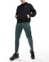 Nike Football Academy Dri-FIT panelled joggers in dark green