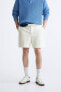 Textured bermuda shorts