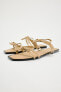 Flat slider sandals with bows