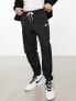 Фото #1 товара Nike Club woven tapered trousers in black
