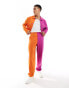 Фото #1 товара ASOS DESIGN smart co-ord colour block barrel leg trouser in orange and pink