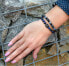 Beaded bracelet made of lava stone and howlite MINK63