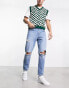 Фото #1 товара ASOS DESIGN tapered fit jeans with busted knees in mid wash blue - MBLUE