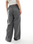 Фото #7 товара In The Style Plus x Perrie Sian exclusive wide leg drawstring trouser in grey pinstripe