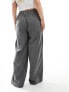 In The Style Plus x Perrie Sian exclusive wide leg drawstring trouser in grey pinstripe