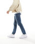 Фото #4 товара ASOS DESIGN slim jeans in mid wash blue