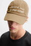 CAP WITH EMBROIDERED SLOGAN