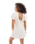 ASOS DESIGN short sleeve romper playsuit with bead detailing in beige