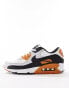 Nike Air Max 90 trainers in white and black