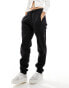 adidas Originals Leopard Luxe joggers in black and leopard three stripe