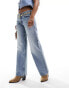 Monki Imoo low waisted wide fit jeans in tinted dirty wash blue