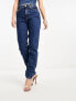 Фото #2 товара Calvin Klein Jeans mom jeans in mid wash